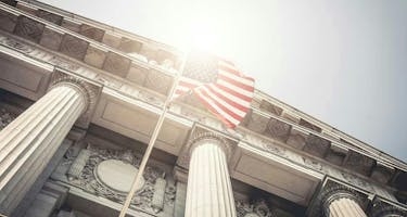 Government building with waving flag