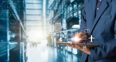 Supply chain manager reviews confirms distribution  in warehouse