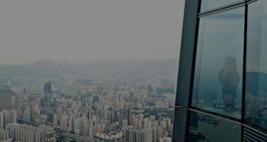 Real estate developer looks at city from above