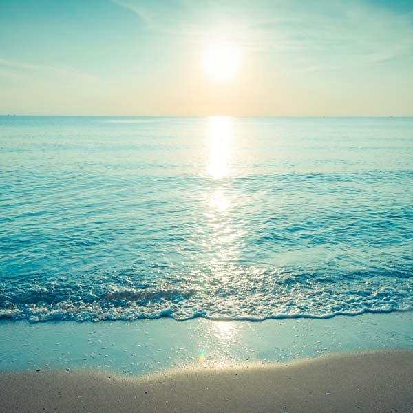 Sun over the ocean at sunrise