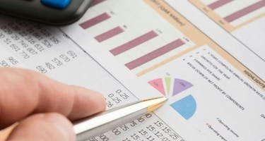 Advisor reviews operating reports