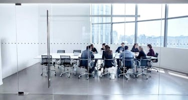 Team meets in conference room