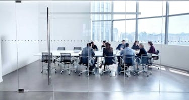 Team meets in conference room